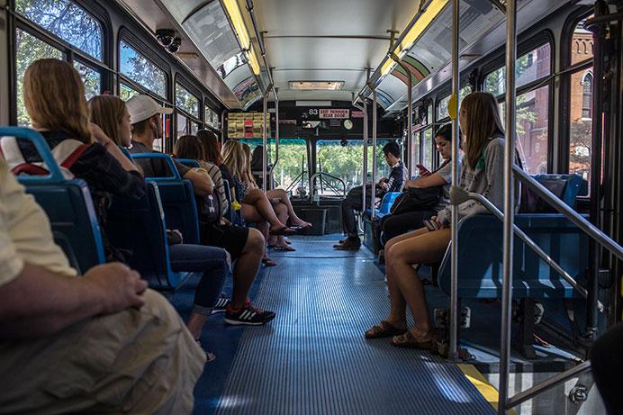 Students ride the Cambus on Monday. With class resuming for the new semester, new students are experiencing the Cambus for the first time. (The Daily Iowan/Sergio Flores)