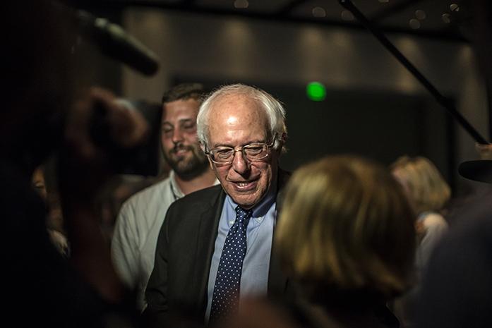 Vermont Senator Bernie Sanders looks out into the crowd as he is introduced at the 2015 Iowa Democratic Hal of Fame inside the Double Tree Hotel in Cedar Rapids on Friday, July 17, 2015. Sanders campaign has seen a dramatic increase in support in the past weeks. (The Daily Iowan/Sergio Flores)