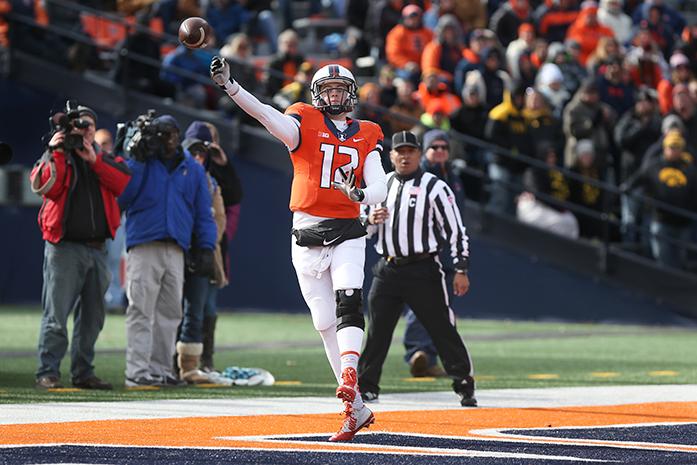 Illinois quarterback Wes Lunt throws an incomplete pass in Memorial Stadium on Saturday, November 15, 2014 in Champaign, Illinois. The play resulted in a safety. The Hawkeyes defeated the Fighting Illini, 30-14. (The Daily Iowan/Tessa Hursh)