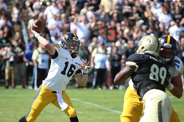 Iowa quarterback C.J. Beathard throws the ball against Purdue at Ross-Ade Stadium on Saturday, Sept. 27, 2014 in West Laffeyette, Indiana. The Hawkeyes defeated the Boilermakers, 24-10. (The Daily Iowan/Joshua Housing)