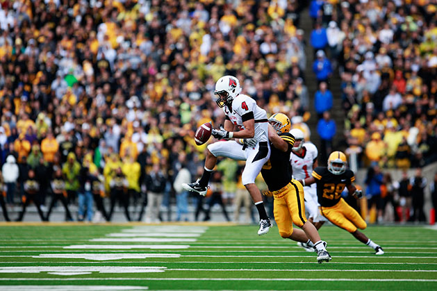 Then-Iowa safety Tyler Sash tackles Ball State’s Daniel Ifft on Sept. 25, 2010, in Kinnick Stadium. (The Daily Iowan/File Photo)