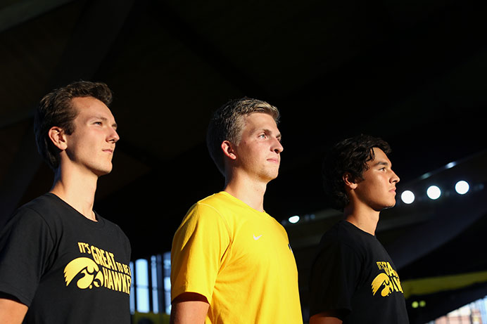 Iowa cross country runners Ian Eklin, Daniel Soto, and Baily Hesse-Withbroe pose for a photo in the Recreation Building on Tuesday. Eklin, Soto, and Hesse-Withbroe are all incoming freshman. (The Daily Iowan/Margaret Kispert)