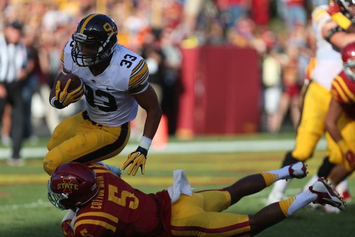 Iowa+running+back+Jordan+Canzeri+is+tackled+during+the+game+against+Iowa+State+at+Jack+Trice+Stadium+on+Saturday%2C+Sep.+12%2C+2015+in+Ames%2C+Iowa.+The+Cyclones+lead+the+Hawkeyes+at+the+half%2C+17-10.+%28The+Daily+Iowan%2FJoshua+Housing%29