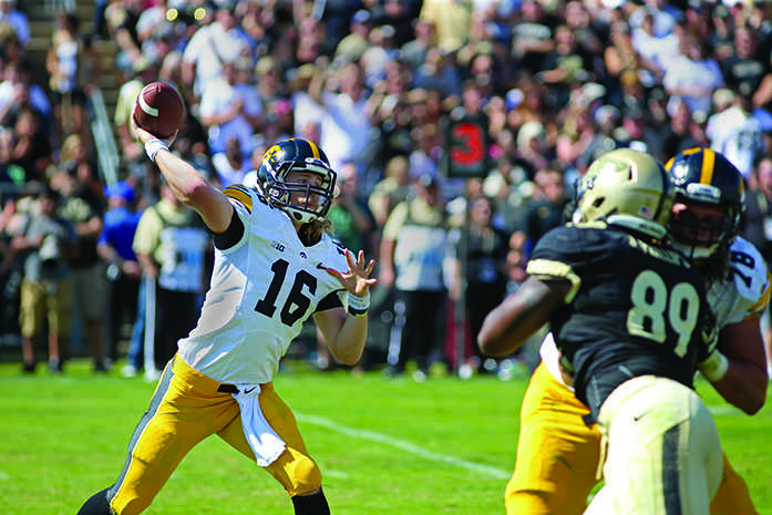 Iowa quarterback C.J. Beathard throws the ball against Purdue at Ross-Ade Stadium on Saturday, Sept. 27, 2014 in West Laffeyette, Indiana. The Hawkeyes defeated the Boilermakers, 24-10. (The Daily Iowan/Joshua Housing)
