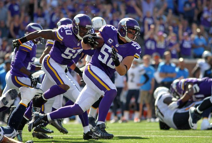 Minnesota Vikings outside linebacker Chad Greenway (52) runs for a touchdown after an interception of a pass from San Diego Chargers quarterback Philip Rivers (17) in the second half of an NFL football game in Minneapolis, Sunday, Sept. 27, 2015. (AP Photo/Andy Clayton-King)