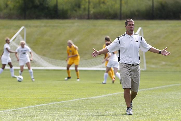 Iowa head coach Ron Rainey reacts to the teams passing against North Dakota at the Iowa Soccer Complex in Iowa City on Sunday, August 19, 2012. The Hawkeyes recorded a 3-0 victory over UND. (The Daily Iowan/Nicholas Fanelli)