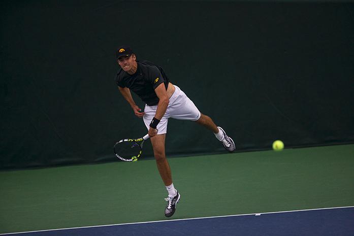 Iowa player Nils Hallestrand serves the ball during the Iowa-Chicago State match at the Hawkeye Indoor Tennis Complex and Recreation on Sunday, April 19, 2015. The Hawkeyes defeated the Cougars, 6-0. (The Daily Iowan/Margaret Kispert)
