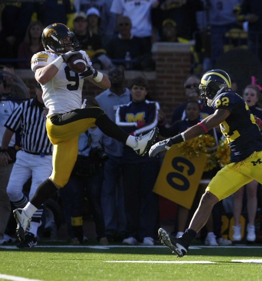 David Scrivner/The Daily Iowan
Iowa's Tyler Sash intercepts the ball during the Iowa vs. Michigan game in Michigan Stadium in Ann Arbor, Mich. on Saturday, Oct. 16, 2010. Iowa won, 38-28.