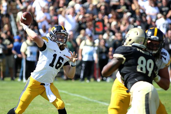 Iowa quarterback CJ Beathard throws the ball against Purdue at Ross-Ade Stadium on Saturday, Sep. 27, 2014 in West Laffeyette, Indiana. The Hawkeyes defeated the Boilermakers, 24-10. (The Daily Iowan/Joshua Housing)