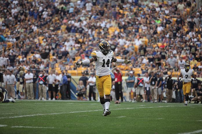 Iowa defensive back Desmond King reacts after breaking up a pass during the game at Heinz Field in Pittsburgh, Pennsylvania on Saturday, Sept. 20, 2014. Iowa defeated Pitt, 24-20. (The Daily Iowan/Tessa Hursh)