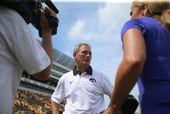 Iowa head coach Kirk Ferentz gets interviewed after the Iowa-Illinois State game in Kinnick on Saturday, Sept. 5, 2015. The Hawkeyes defeated the Redbirds, 31-14. (The Daily Iowan/Margaret Kispert)