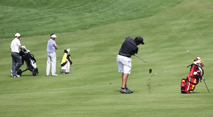 Minnesota golfer Jose Mendez hits a divitt out of the groud during the Hawkeye-Great River Entertainment Invitational on Saturday, April 28, 2015. Iowa State won the meet, and Iowa came in second. (The Daily Iowan/John Theulen)