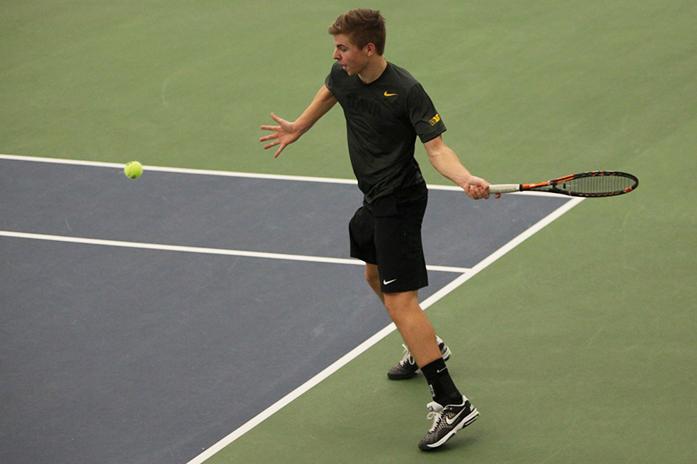 Iowa tennis player Stieg Marten during the Iowa-Marquette match in the Hawkeye Tennis and Recreation Complex on Friday, Feb. 6, 2015. Marten won over Marquettess Andre Romanello, 2-1. The Hawkeyes defeated the Golden Eagles, 7-0. (The Daily Iowan/Margaret Kispert)