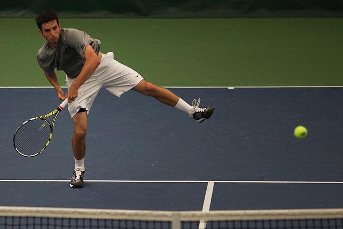 Iowa player Josh Silverstein hits the ball during the Iowa-Chicago State match at the Hawkeye Indoor Tennis Complex and Recreation on Sunday, April 19, 2015. The Hawkeyes defeated the Cougars, 6-0. (The Daily Iowan/Margaret Kispert)