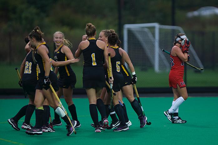 The Iowa field hockey team celebrates after scoring against Rutgers at Grant Field on Friday, Sept. 18, 2015. Iowa won against Rutgers, 4-3. (The Daily Iowan/Joshua Housing)