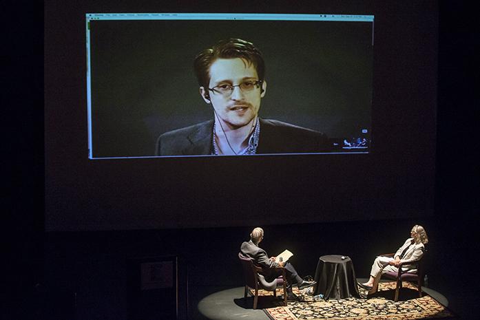 Former member of the CIA, Edward Snowden joined Ray McGovern and Coleen Rowley during a lecture about government transparency and the fourth amendment. (The Daily Iowan/Sergio Flores)