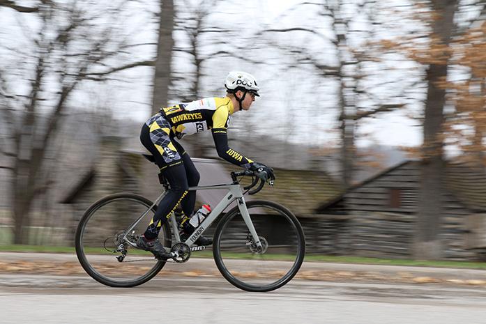 UI Senior and President of the UI Cycling Club Jacob Glahn traverses the hills of Brown St. with his bike on Tues., April 7th. The University of Iowa Student Government is in the process of formulating a University sponsored bike sharing program. The bike share program would offer students the opportunity to rent bicycles from the UI at various stations around campus.(The Daily Iowan/John Baker)