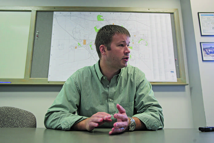 Jason Havel discusses Iowa Citys proposal to build wider lanes for safety purposes on Wednesday, Sep. 9, 2015. Havel is an engineer for the city of Iowa City. (The Daily Iowan/Brooklynn Kascel)