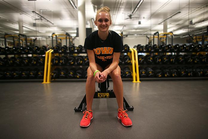 Iowa runner Madison Waymire sits in the Hawkeye-Carver heights room on Wednesday, Sept. 9, 2015. Waymire has dreamed of running cross country in college since she was a sixth grader. (The Daily Iowan/Margaret Kispert)