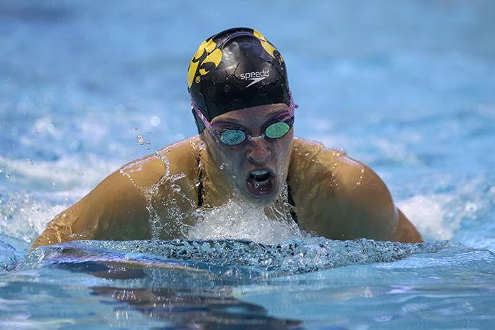 Iowa womens swim team member Emma Sougstad is shown during the 200 IM at the University of Iowa Rec. and Wellness Center on Saturday, Oct. 4, 2014. The Iowa womens team came in second place Saturday defeating Nebraska but falling to Michigan. (The Daily Iowan/Sergio Flores)