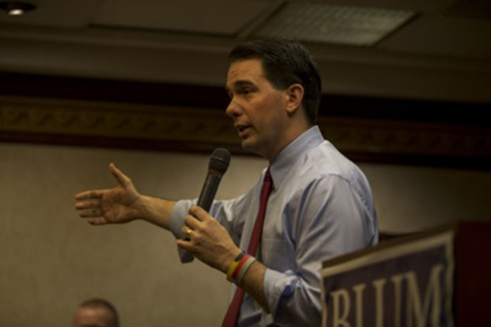 Wisconsin+Gov.+Scott+Walker+gives+a+speech+during+a+fundraiser+for+Rep.+Rod+Blum+at+the+Cedar+Rapids+Marriott+on+Friday%2C+April+24%2C+2015.+Walker%2C+a+rising+conservative+leader%2C+said+he+will+make+a+decision+on+a+2016+presidential+campaign+in+June.+%28The+Daily+Iowan%2FPeter+Kim%29