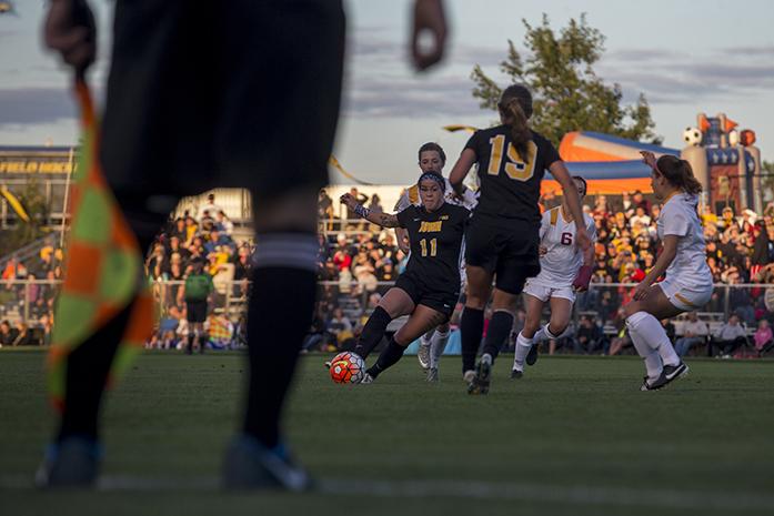 Iowa forward Bri Toelle penetrates Cyclones defense during the game on Friday, September 11, 2015. The Hawkeyes defeated the Cyclones, 1-0. (The Daily Iowan/Peter Kim)