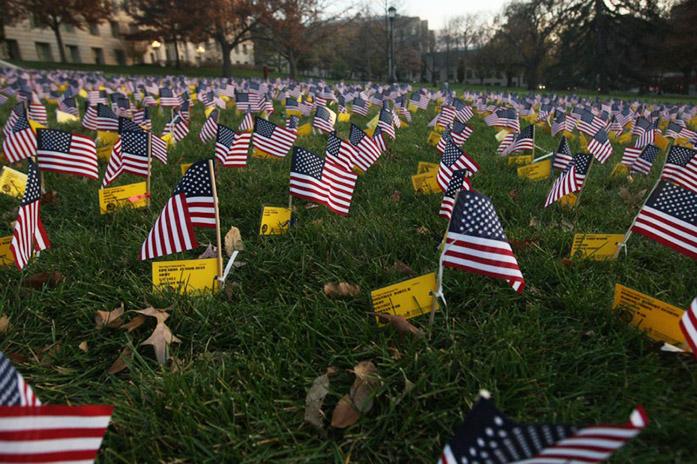 The Iowa Veterans Day Flag Display on Monday, Nov. 10, 2014. The display contains 5625 flags, each in honor of a Veteran that has a relation with the University. (The Daily Iowan/McCall Radavich)