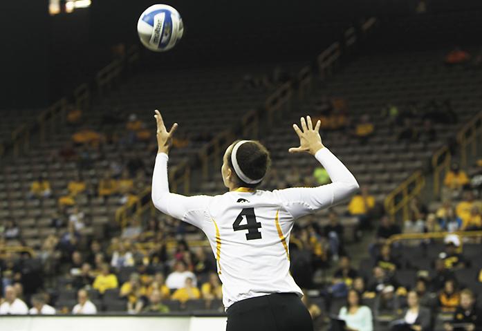 Iowa outside hitter Ashley Mariani hits the ball at the Drake vs. Iowa volleyball match inside of Carver-Hawkeye Arena on Saturday, Sept. 19, 2015. Iowa beat Drake, 3-0. (The Daily Iowan/Courtney Hawkins)