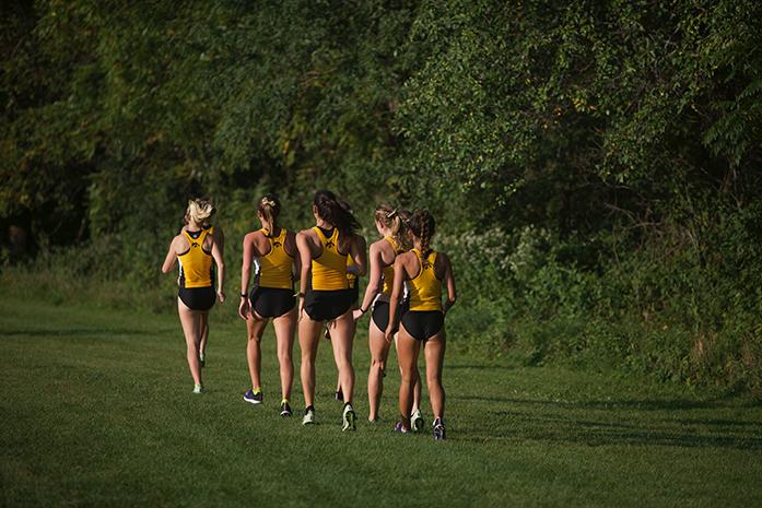 The+University+of+Iowa+Womens+Cross+Country+team+warms+up+before+the+start+of+the+3k+race+at+the+Ashton+Cross+Country+Course+in+Iowa+City%2C+Iowa+on+Friday%2C+Sep.+4%2C+2015