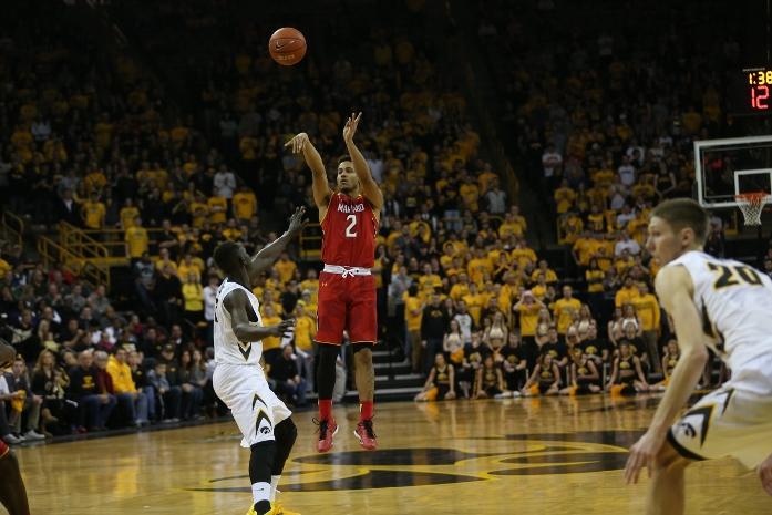 Maryland+guard+Melo+Trimble+attempts+a+three-pointer+during+the+Iowa-Maryland+game+in+Carver-Hawkeye+Arena+on+Sunday%2C+Feb.+8%2C+2015.+Timble+scored+20+points+during+the+game.+Iowa+defeated+Maryland%2C+71-55.+%28The+Daily+Iowan%2FJohn+Theulen%29