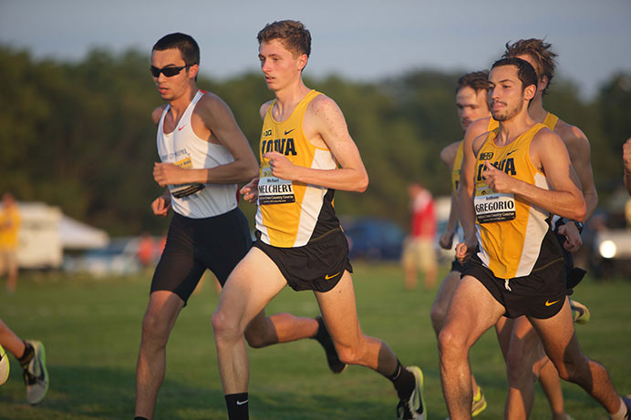 Hawkeyes Michael Melchert and Senior Anthony Gregorio move to the front of the pack after the start of their 6K race on Sep. 4 at the Ashton Cross-Country Course. (The Daily Iowan/Brooklynn Kascel)