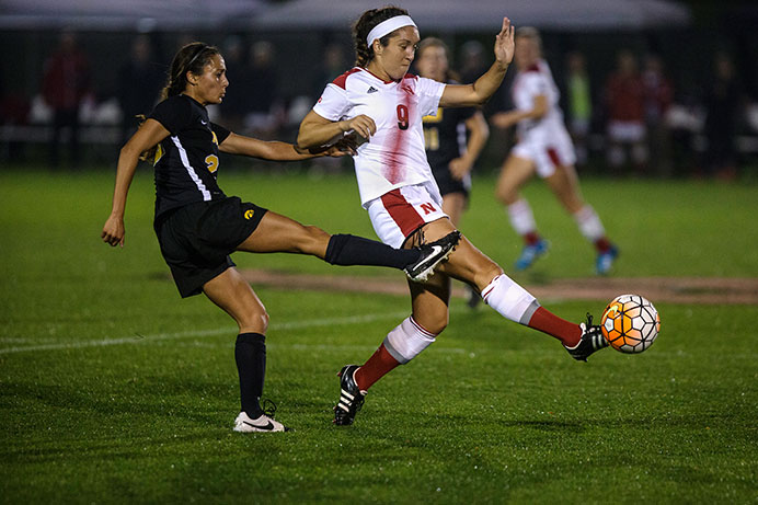 Nebraska midfielder Sydney Miramontez attempts to get past Iowa midfielder Hannah Kousheh during the game on Oct. 23. Nebraska may have a chance to get in one of the remaining spots of the Big Ten Tournament this year. (The Daily Iowan/Sergio Flores)