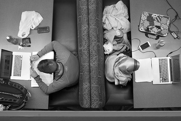 UI students study on the first floor in the Main Library on Thursday, Oct. 29, 2015. As Halloween weekend approaches, many students continue to study rather than going downtown. (The Daily Iowan/McCall Radavich)