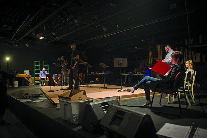 The cast of It Came From Riverside rehearses its opening skit to the their upcoming play at Riverside Theatre, Wednesday October 21, 2015. It Came From Riverside will go on at Riverside Theatre Friday, Oct. 23, and Saturday, Oct. 24 at 7:30 pm. (The Daily Iowan/Jordan Gale)