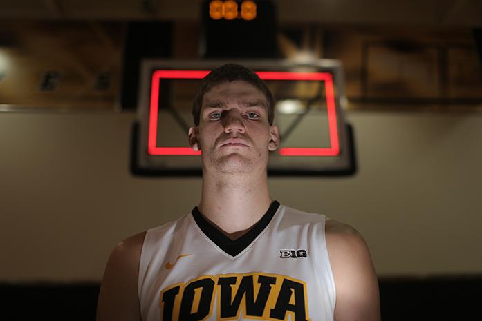 Iowa center Adam Woodbury poses for a photo during Media Day in Carver-Hawkeye Arena on Wednesday, Oct. 7, 2015. The Hawkeyes will open their season at home against Souix Falls on Oct. 29, 2015. (The Daily Iowan/Margaret Kispert)