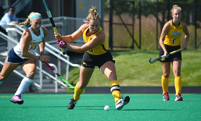 Iowa forward Stephanie Norlander prepares to hit the ball at Grant Field on Saturday, Sept. 12, 2015. The Hawkeyes defeated the Golden Flashes 7-1. (The Daily Iowan/Valerie Burke)