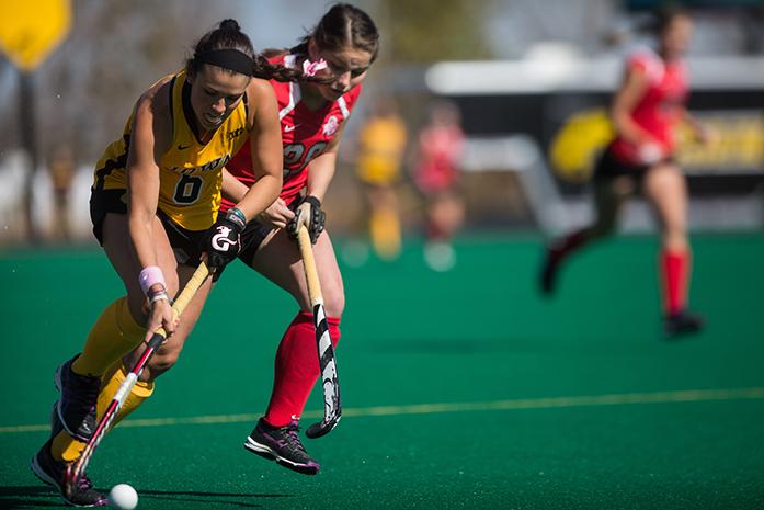Mallory Lefkowitz races down battling and Ohio State player, Iowas womens field hockey team lost to Ohio State 3-1 at Grant Field on Sunday, October 18th, 2015. (The Daily Iowan/Anthony Vazquez)