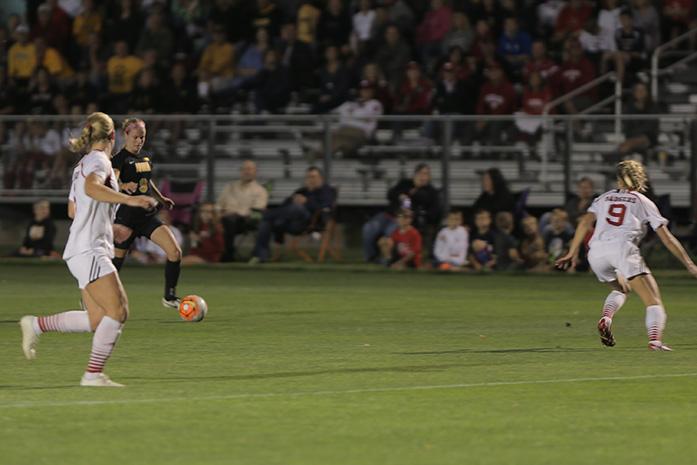 Iowa Junior defenseman Amanda Lulek dribbles the ball up the field against Wisconsin at the Iowa Soccer Complex Thursday night October 8th, 2015. Iowa played tough but lost 2-0 bringing their record to 6-6-1 on the season. (The Daily Iowan/Kyle Close)