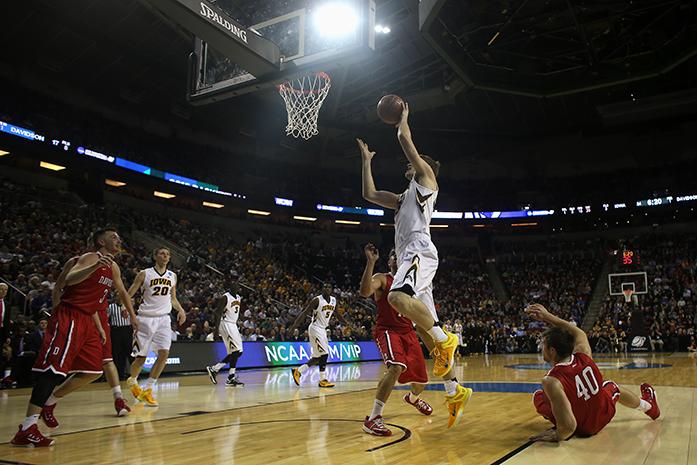 Iowa center Adam Woodbury (34) drives against Davidson at Key Arena on Friday, Mar. 20, 2015 in Seattle, Washington. The Hawkeyes defeated the Wildcats, 83-52. (The Daily Iowan/Joshua Housing)