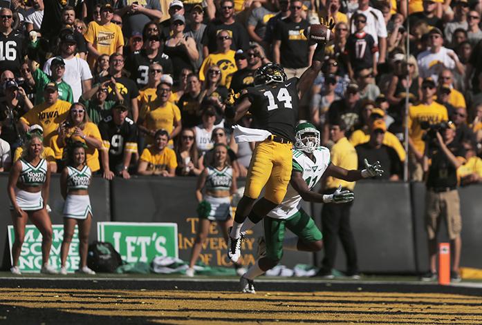 Iowa defensive back Desmond King blocks a pass meant for North Texas wide receiver Thaddeous Thompson during the Iowa-North Texas game in Kinnick Stadium on Saturday, Sept. 26, 2015. The Hawkeyes defeated the Mean Green, 62-16. (The Daily Iowan/Margaret Kispert)