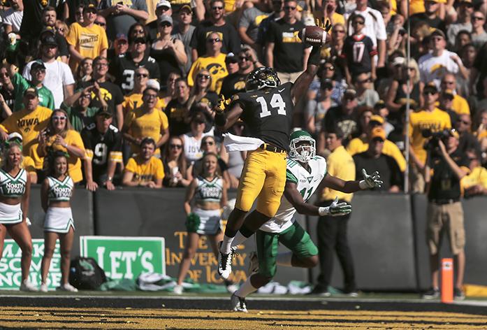 Iowa defensive back Desmond King blocks a pass ment for North Texas wide receiver Thaddeous Thompson during the Iowa-North Texas game in Kinnick Stadium on Saturday, Sept. 26, 2015. The Hawkeyes defeated the Mean Green, 62-16. (The Daily Iowan/Margaret Kispert)