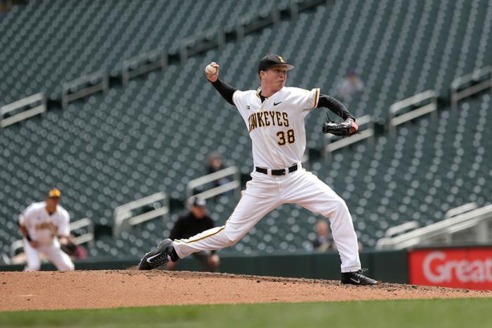 Iowa pitcher Tyler Peyton pitches the ball during the first round of the Big Ten baseball tournament at Target Field in Minneapolis on Wednesday, May 20, 2015. The Hawkeyes defeated the Buckeyes, 3-2 to advance to play Michigan. (The Daily Iowan/Margaret Kispert)
