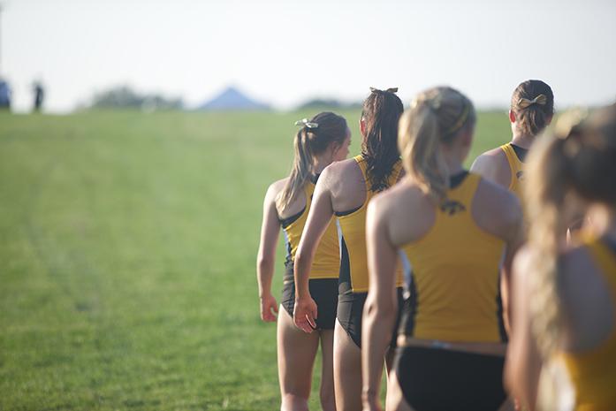 The University of Iowa Womens Cross Country team heads to the starting line for the 3k race on Friday, September 4, 2015 at the Ashton Cross Country Course in Iowa City, Iowa.