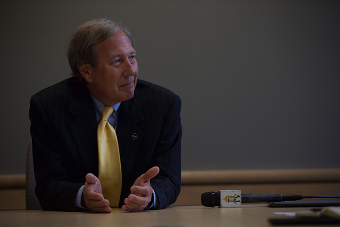 Bruce Harreld talks with reporters in The Daily Iowan conference room about his upcoming term as the next president of the University of Iowa. Upon his acceptance, Harreld had an approval rating of three percent. (The Daily Iowan/Brooklynn Kascel)