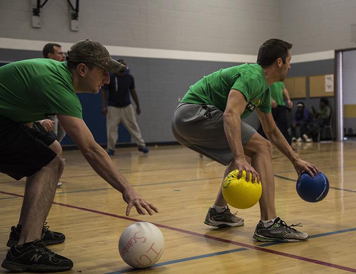 Johnson+County+team+members+grab+the+dodge-balls+off+the+line+at+the+beginning+of+the+match%2C+area+police+departments+came+together+to+support+the+1st+Annual+Special+Olympics+Iowa+Dodgeball+Tournament%2C+at+Grant+Wood+Elementary+School+in+Iowa+City%2C+Iowa+on+Nov.+8.%28The+Daily+Iowan%2FAnthony+Vazquez%29