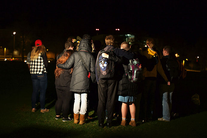 Students of the University of Iowa held a candlelight vigil for those affected by terrorism this past week on Nov 18. The students hold these events for those affected can have a safe place to share their stories and grievance on the topic. (The Daily Iowan/Glenn Sonnie Wooden) 