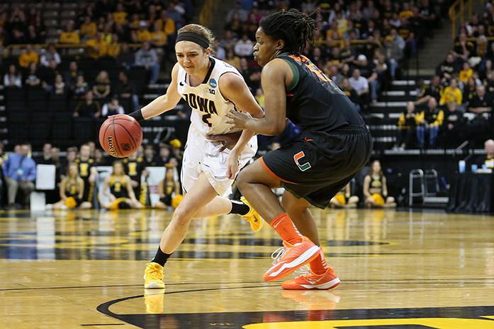 Iowa+guard+Ally+Disterhoft+dribbles+the+ball+against+Miami+forward+Necole+Sterling+during+the+second+round+game+of+the+NCAA+womens+basketball+tournament+in+Carver-Hawkeye+Arena+on+Sunday%2C+March+22%2C+2015.+The+Hawkeyes+defeated+the+Hurricanes%2C+88-70+advancing+to+Sweet+Sixteen+in+Oklahoma+City+.+%28The+Daily+Iowan%2FMargaret+Kispert%29