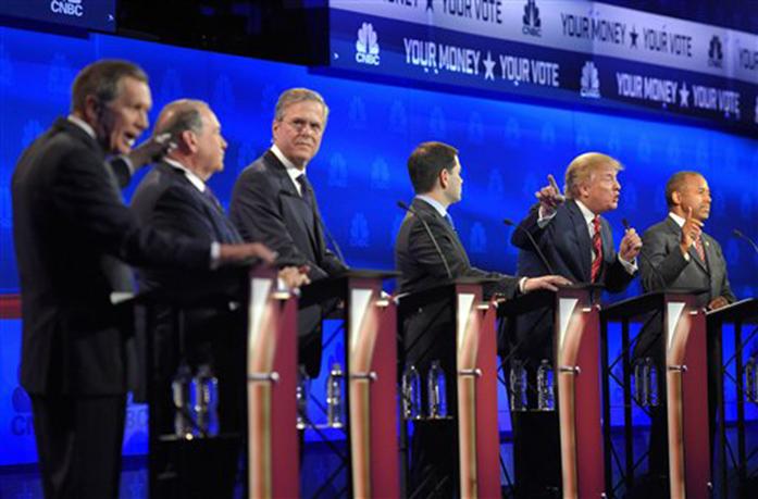 FILE - In this Oct. 28, 2015, Republican presidential candidate, from left, Ohio Gov. John Kasich, former Arkansas Gov. Mike Huckabee, former Florida Gov. Jeb Bush, Sen. Marco Rubio, R-Fla., Donald Trump and Ben Carson, participate in a debate in Boulder, Colo. Despite a handful of high-profile defections, most Republican presidential candidates are still demanding changes to the GOPís coming debates. Thatís not to say they are speaking with one voice. The White House hopefuls have distinct, sometimes contradictory, strategies to score political points from the uproar. (AP Photo/Mark J. Terrill, File)