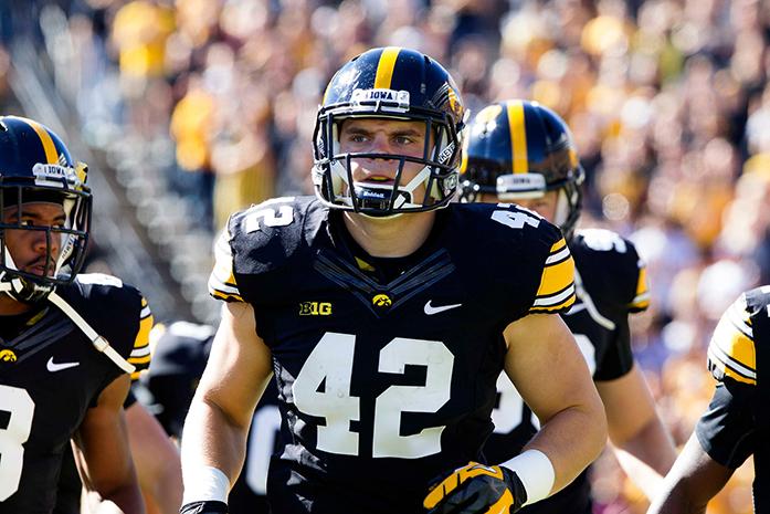 Fullback+Macon+Plewa+looks+determined+as+he+comes+out+of+the+tunnel+with+the+rest+of+the+Hawkeye+team+at+Kinnick+Stadium+on+Saturday%2C+September+21st%2C+2013.+Iowa+defeated+Western+Michigan+59-3.+%28The+Daily+Iowan%2FCallie+Mitchell%29