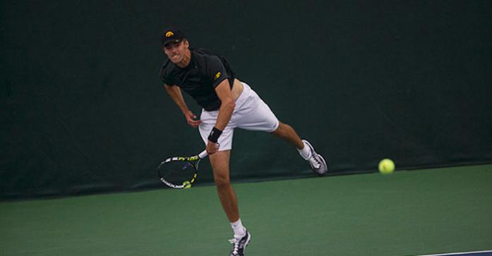 Iowa player Nils Hallestrand serves the ball during the Iowa-Chicago State match at the Hawkeye Indoor Tennis Complex and Recreation on Sunday, April 19, 2015. The Hawkeyes defeated the Cougars, 6-0. (The Daily Iowan/Margaret Kispert)